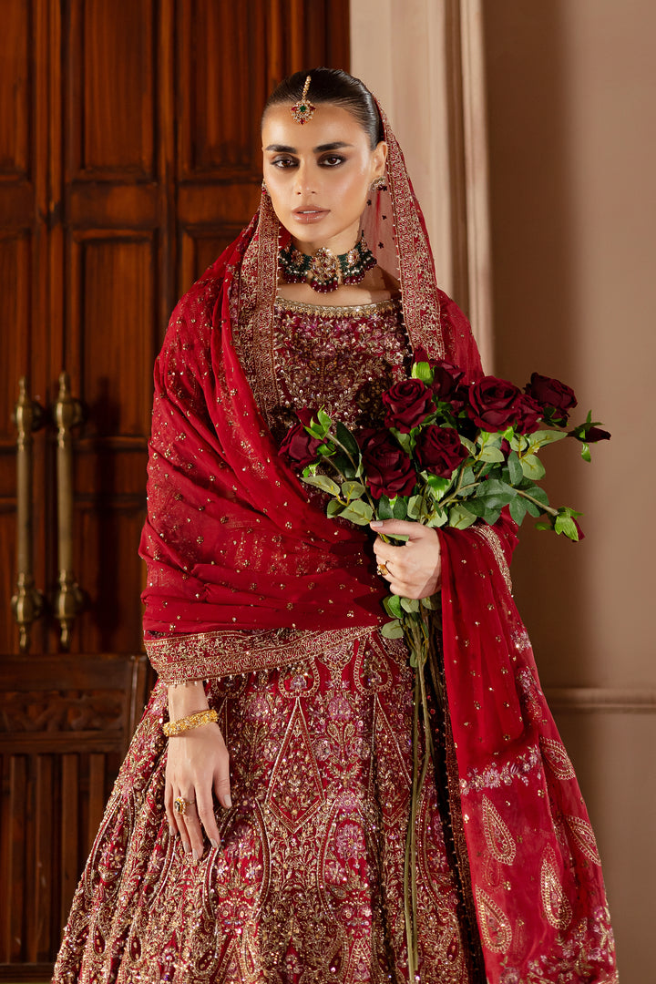 Batik heavily embellished bridal choli with keyhole neckline and tassel hangings for regal elegance. Bridal luxury Pakistani South Asian affordable.
