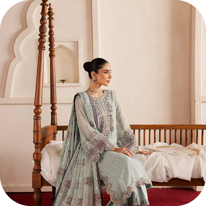 Luxury pret for Eid featuring delicate embellishments and flowing silhouette
