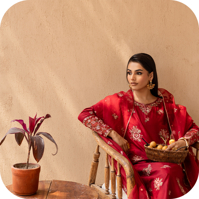 Woman wearing a vibrant printed festive dress for Eid ul Adha 2025