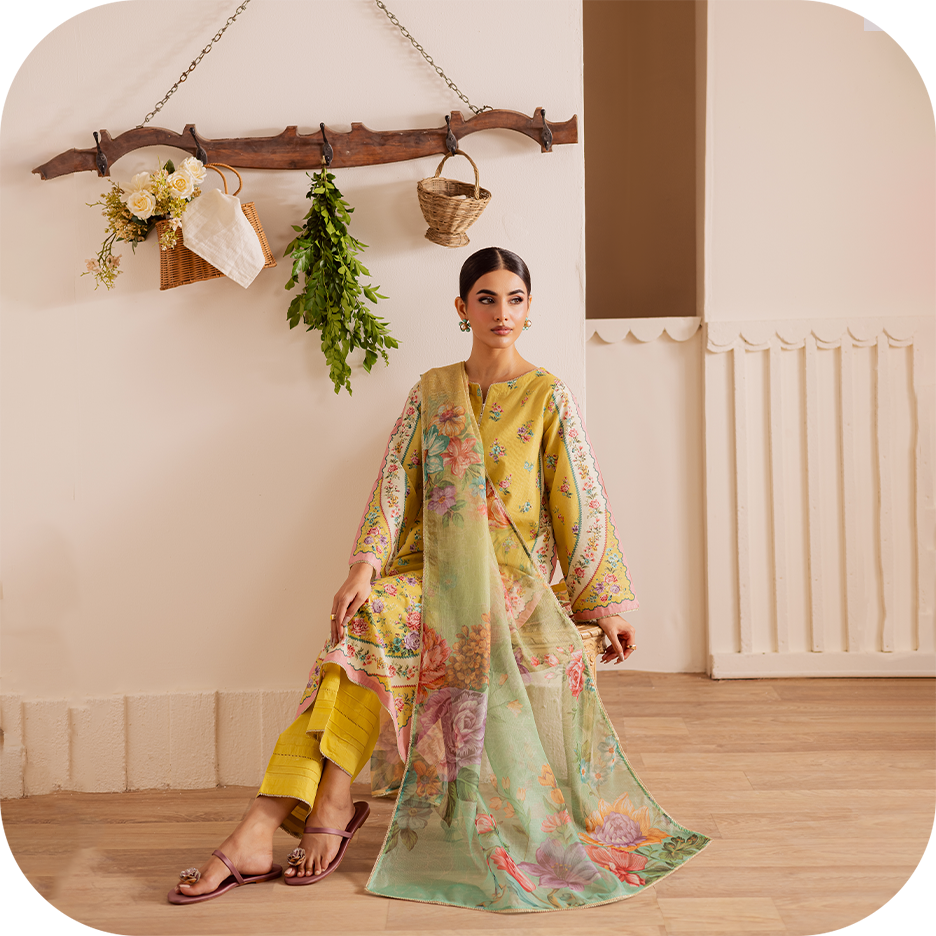 Woman wearing elegant summer pret outfit with minimal embroidery, perfect for a workday.