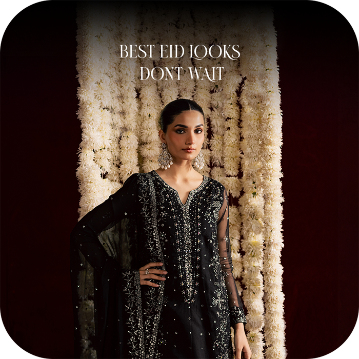 Woman wearing a festive embroidered outfit for Eid celebration