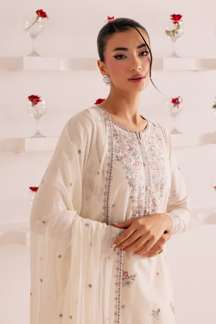 Pakistani festive outfit in off-white embroidered pima lawn, styled with lace borders and delicate dupatta. Modern South Asian ready-to-wear fashion - available online with fast UAE and international shipping