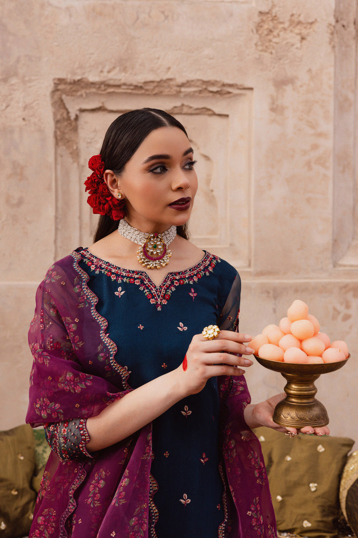 Batik UAE Aleysa three piece raw silk set featuring an embroidered short shirt with kaviya finishing organza sleeves flared embroidered sharara and printed organza dupatta with sequin spread. Affordable ethnic South Asian Desi Indian Pakistani designer wear UAE fashion for teens adults girls and women available in sizes  S M L festive eid 