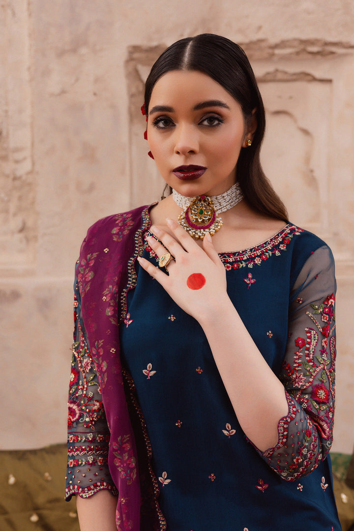 Batik UAE Aleysa three piece raw silk set featuring an embroidered short shirt with kaviya finishing organza sleeves flared embroidered sharara and printed organza dupatta with sequin spread. Affordable ethnic South Asian Desi Indian Pakistani designer wear UAE fashion for teens adults girls and women available in sizes  S M L festive eid 