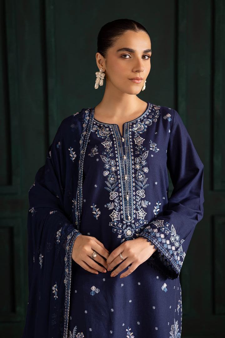 Batik UAE Adoro three piece khaddar set featuring a long blue embroidered shirt with crochet lace finishing paired with embroidered culottes and crinkle dupatta. Affordable ethnic South Asian Desi Indian Pakistani designer wear UAE fashion for teens adults girls and women available in sizes XS S M L XL.