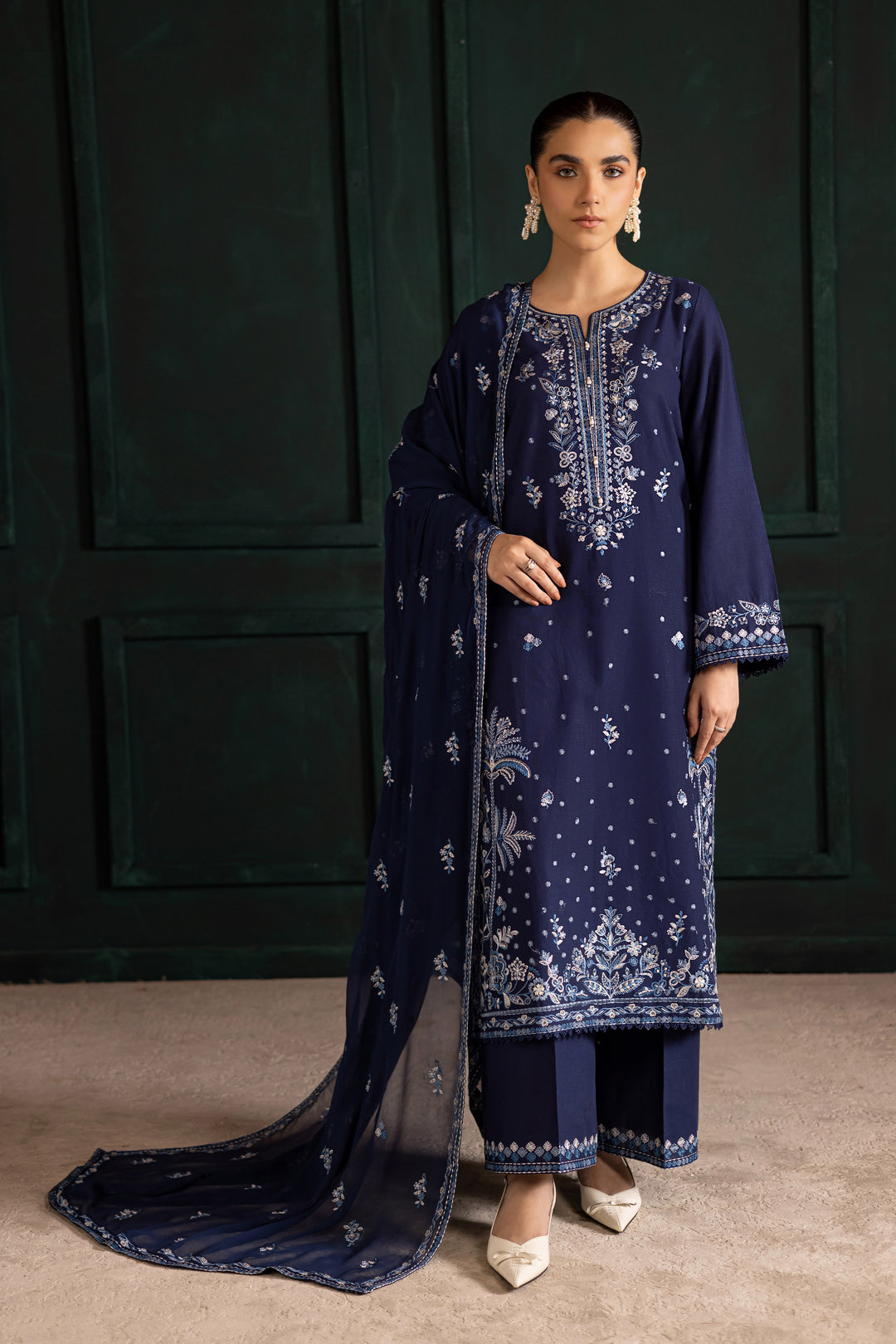 Batik UAE Adoro three piece khaddar set featuring a long blue embroidered shirt with crochet lace finishing paired with embroidered culottes and crinkle dupatta. Affordable ethnic South Asian Desi Indian Pakistani designer wear UAE fashion for teens adults girls and women available in sizes XS S M L XL.