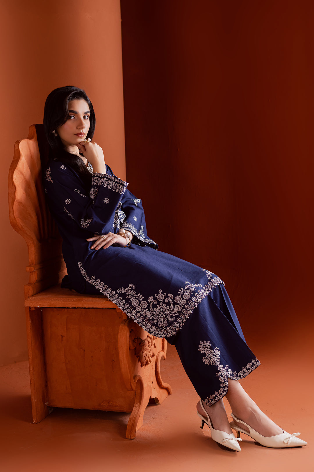 Radiate effortless charm with the Bloom two-piece set, featuring a beautifully composed embroidered midnight blue khaddar shirt that brings elegance due to every detail. The neckline is accented with delicate embroidered tassels, adding a playful yet refined touch.

Paired with matching khaddar culottes, this ensemble offers a graceful and modern silhouette—perfect for daytime festivities or casual gatherings.