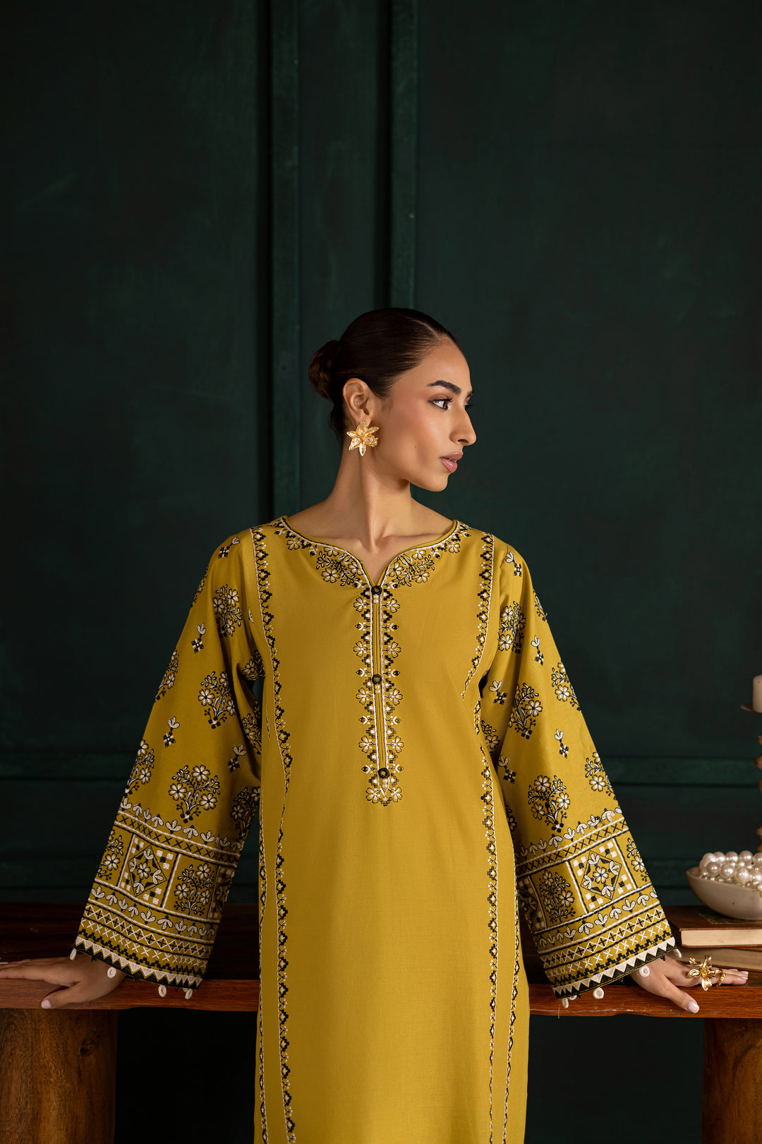 Batik UAE Kantha two piece khaddar set in lemon green featuring embroidered sleeves with mirror and bead detailing. Affordable ethnic South Asian Desi Indian Pakistani designer wear UAE fashion.