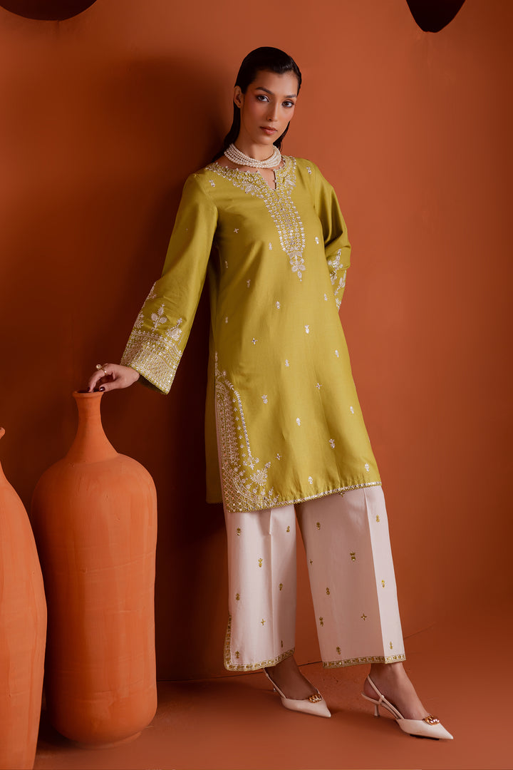 Stylish Pakistani khaddar outfit with pearl-embellished neckline and embroidered culottes, offering timeless elegance at an affordable price