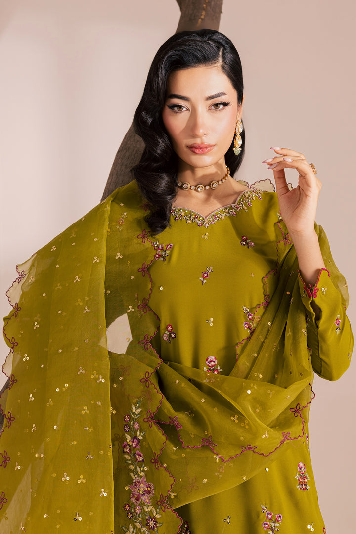 Olive green Pakistani embroidered 3-piece suit with chiffon dupatta, detailed floral motifs, and fine embellishments. Affordable festive ethnic wear for South Asian women, available globally from Batik
