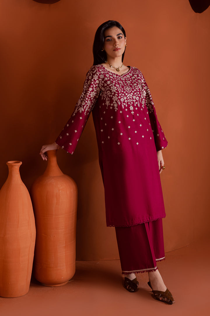 Luxury raspberry cherry pink khaddar outfit for women with fine embroidery and pearl detailing, premium Pakistani ethnic clothing available online in UAE and worldwide