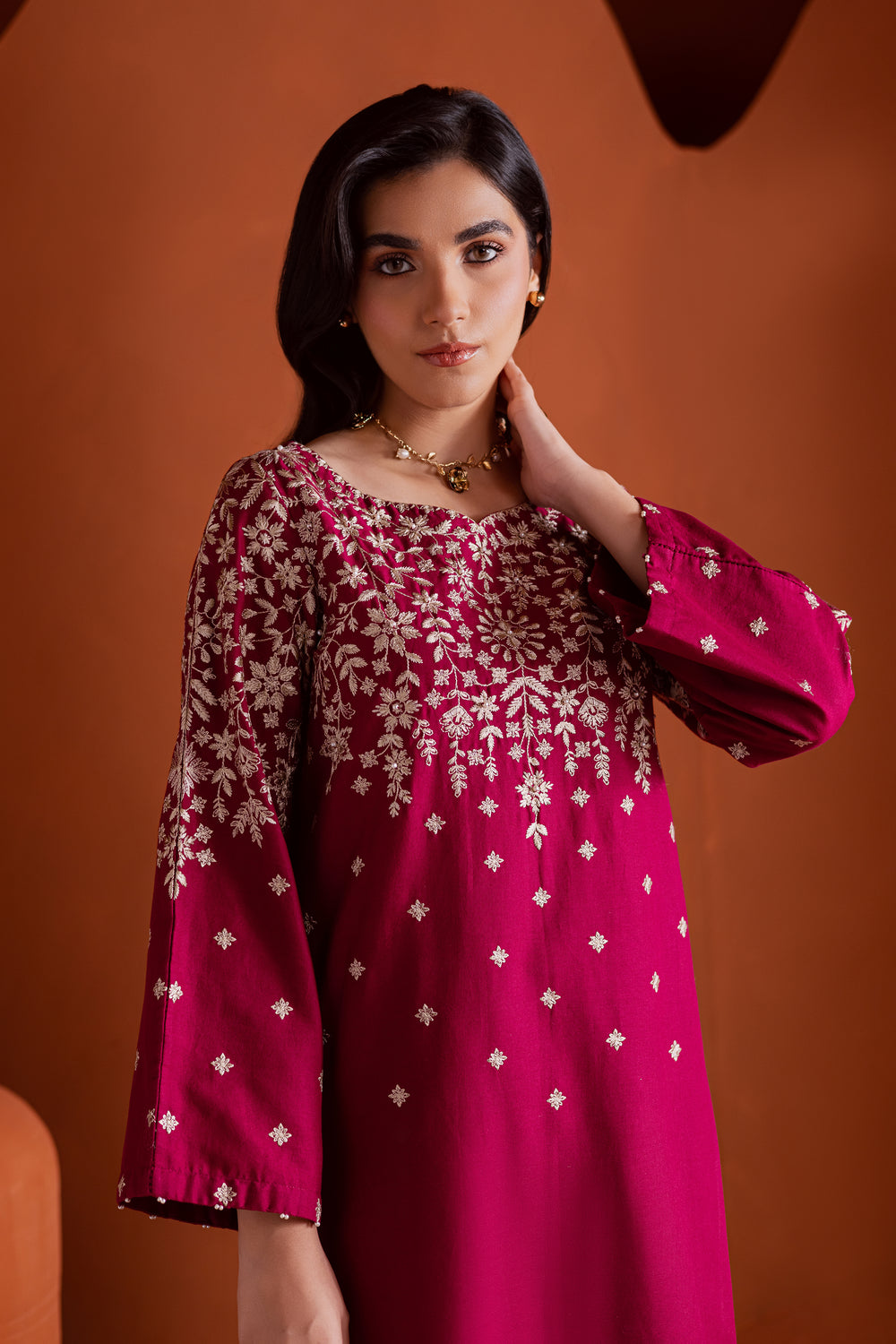 Cherry inspired womens ready to wear khaddar outfit in raspberry pink with pearl embellishments and embroidered culottes, affordable ethnic fashion in UAE