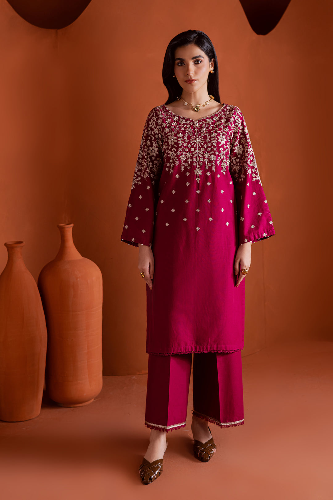 Raspberry pink embroidered khaddar two piece ethnic set with pearl detailing, elegant Pakistani festive wear with fast delivery across the UAE