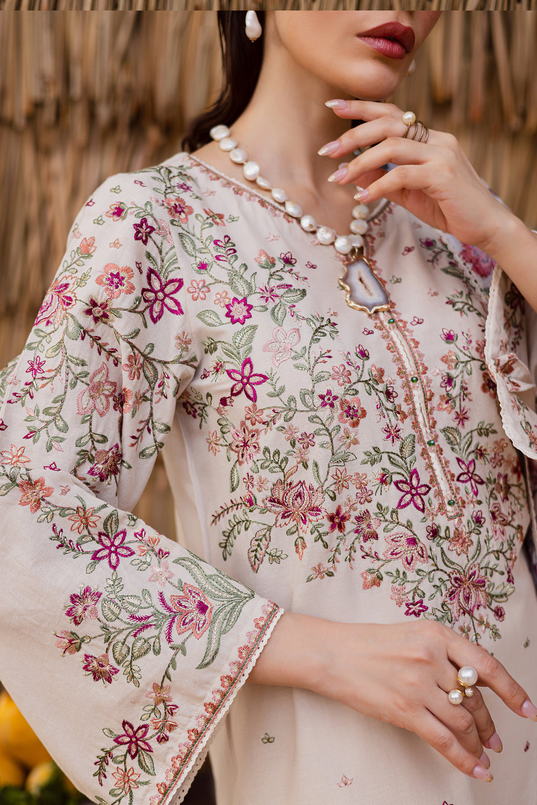 Long embroidered khaddar shirt with lace-finished culottes and printed dupatta — a refined ready-to-wear Pakistani ensemble