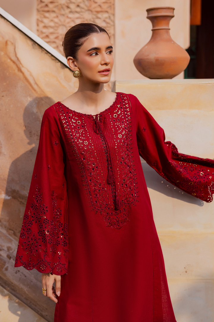 Batik UAE two piece khaddar set featuring a heavily embroidered shirt with boring work tassel embellishments and kabua finished sleeves paired with embroidered khaddar culottes. Affordable ethnic South Asian Desi Indian Pakistani designer wear UAE fashion for teens adults girls and women available in sizes XS S M L XL.