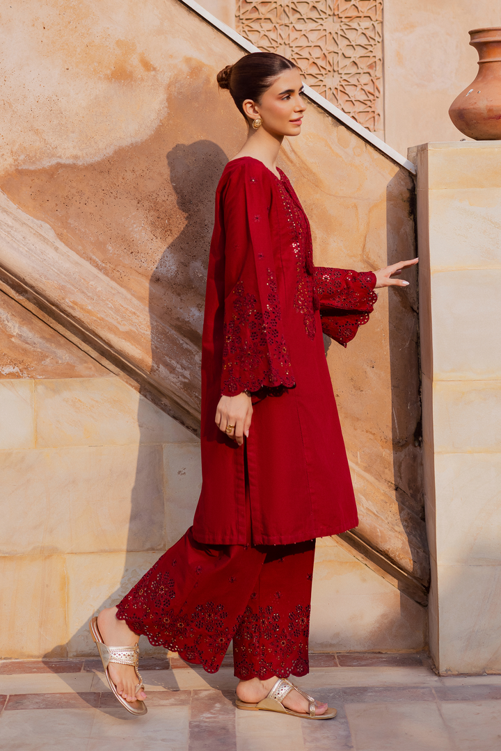 Batik UAE two piece khaddar set featuring a heavily embroidered shirt with boring work tassel embellishments and kabua finished sleeves paired with embroidered khaddar culottes. Affordable ethnic South Asian Desi Indian Pakistani designer wear UAE fashion for teens adults girls and women available in sizes XS S M L XL.
