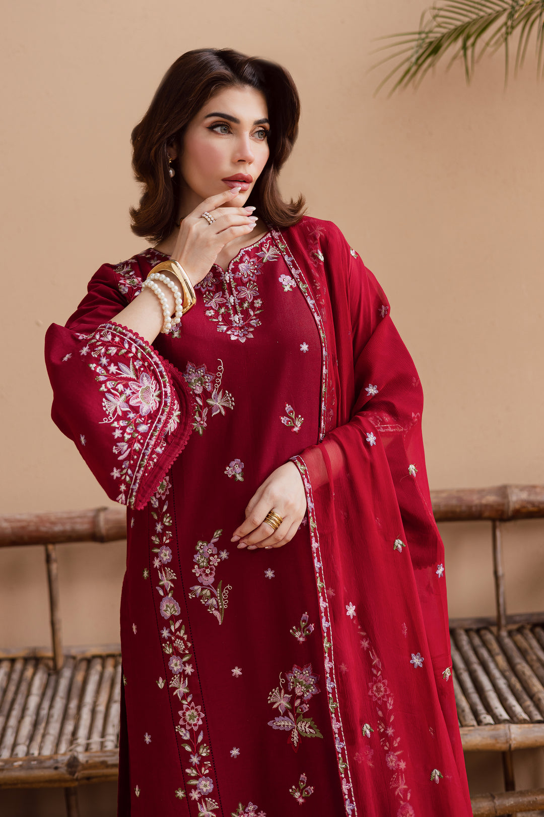 Rich beetroot red embroidered 3 piece dress styled with crinkle dupatta. Pakistani ethnic wear for women, ready to wear and easy to order online