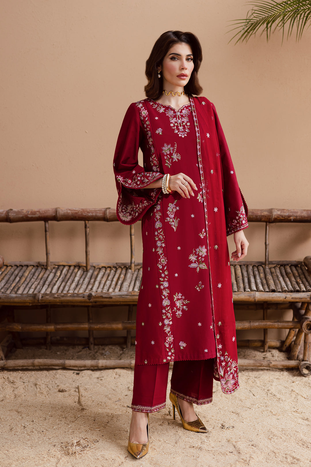 Full length image of beetroot red khaddar 3 piece. Embroidered shirt, trousers and dupatta for timeless Pakistani elegance