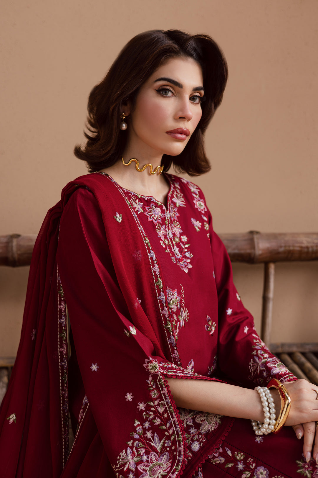 Embroidered crinkle dupatta and sleeve border with lace trimming. Elegant Pakistani ready to wear dress for formal gatherings